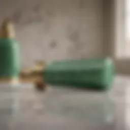 A close-up of a jade roller on a marble countertop