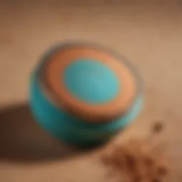 Close-up of Moroccanoil Texture Clay with its packaging