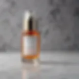 Elegant bottle of Murad Rapid Age Serum on a marble surface