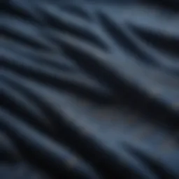 Close-up view of rigid denim fabric showcasing its texture and weave
