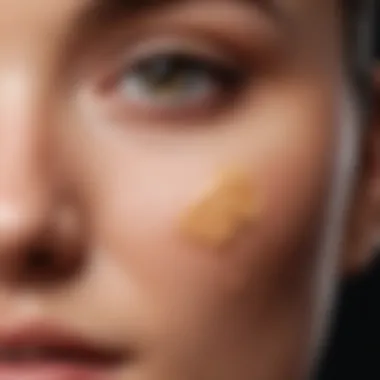 Close-up of blending sponge blending concealer for natural look