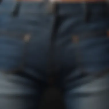 Close-up of the waistband of muffin top jeans