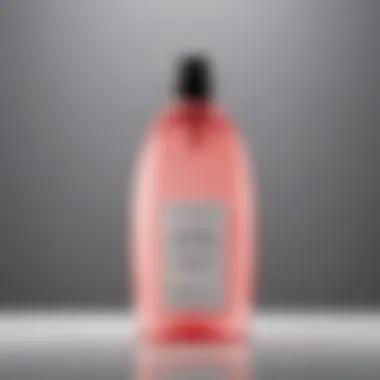 A close-up view of a clarifying shampoo bottle with a clear liquid inside.