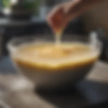 Clothing soaking in a bowl with detergent solution