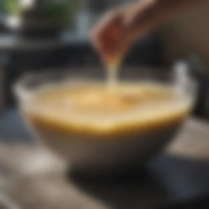 Clothing soaking in a bowl with detergent solution